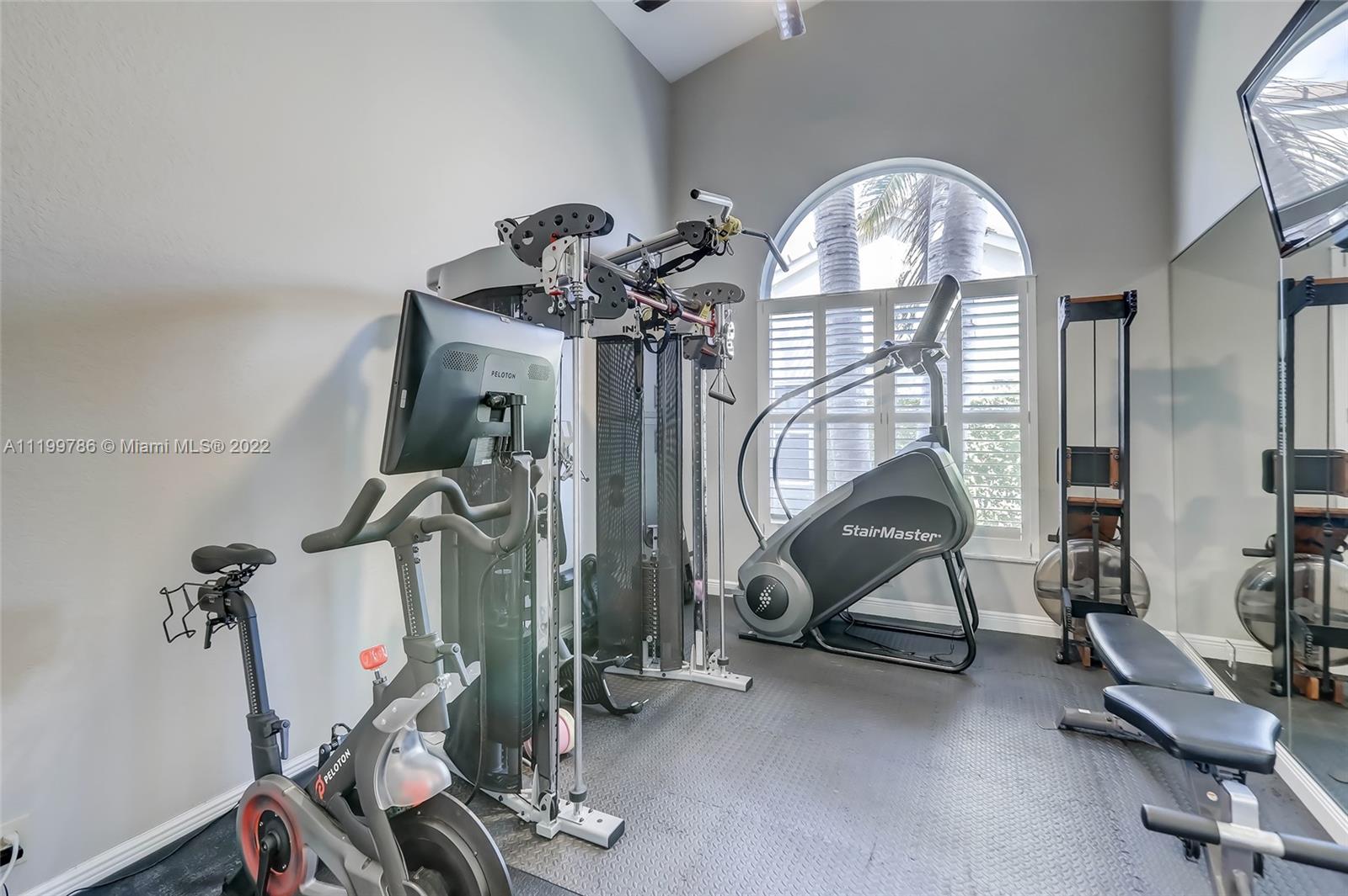 9901 North Abiaca Circle Davie, FL 33328 - Photo 9 of 46 a view of a room with gym equipment