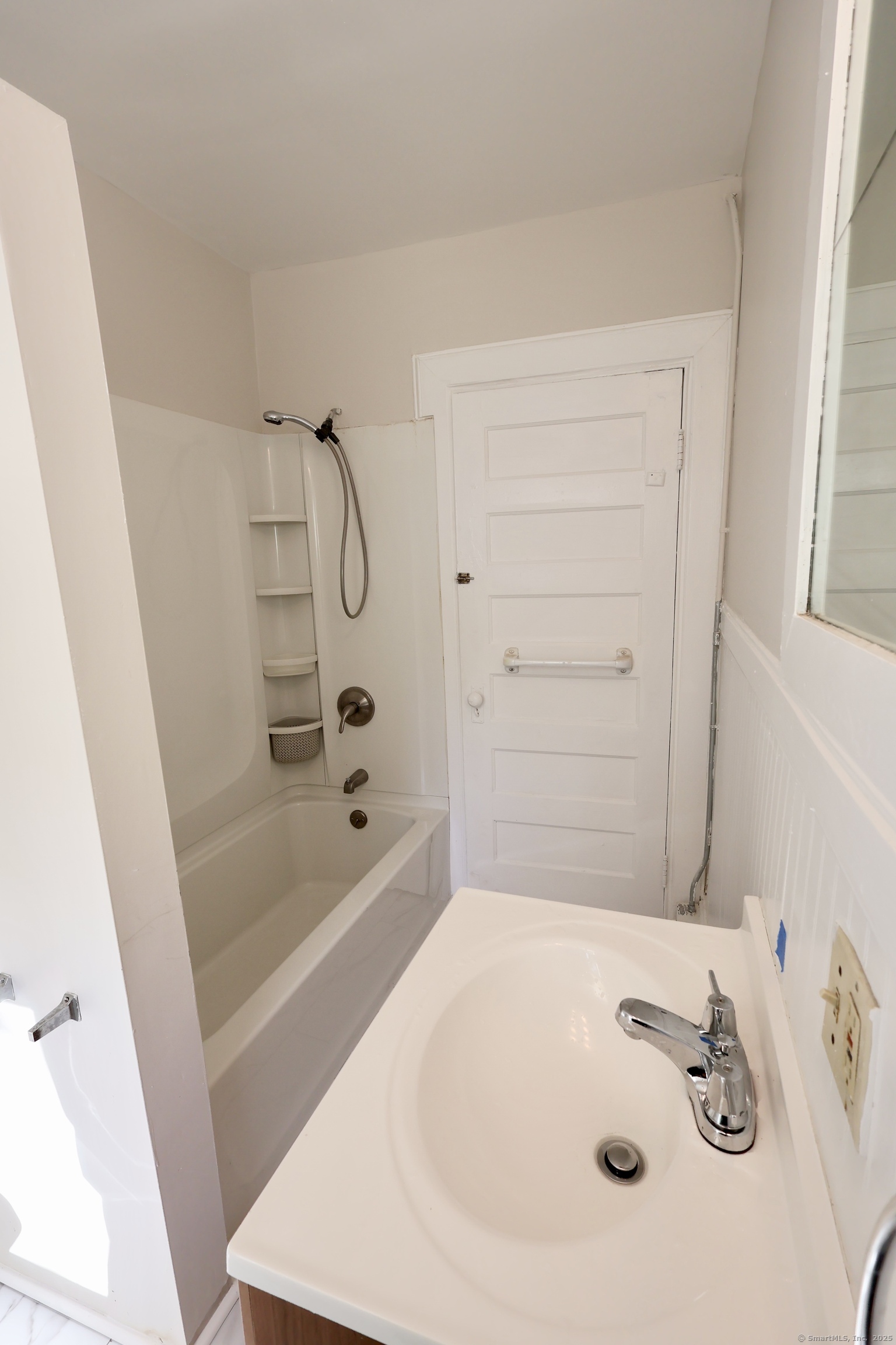 101 Stearns Street Bristol, CT 06010 - Photo 17 of 18 a bathroom with a bathtub and a shower