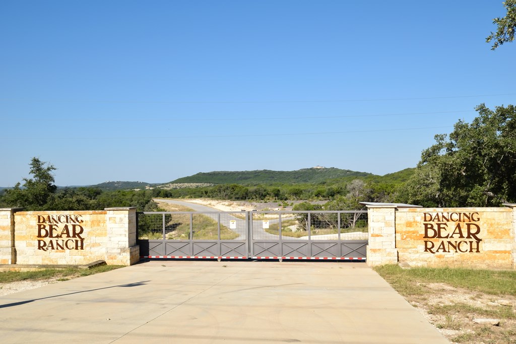 Lot 8 Private Road 1708, Unit 8 Mico, TX 78056 - Photo 3 of 32 a view of a lake with a mountain in the background