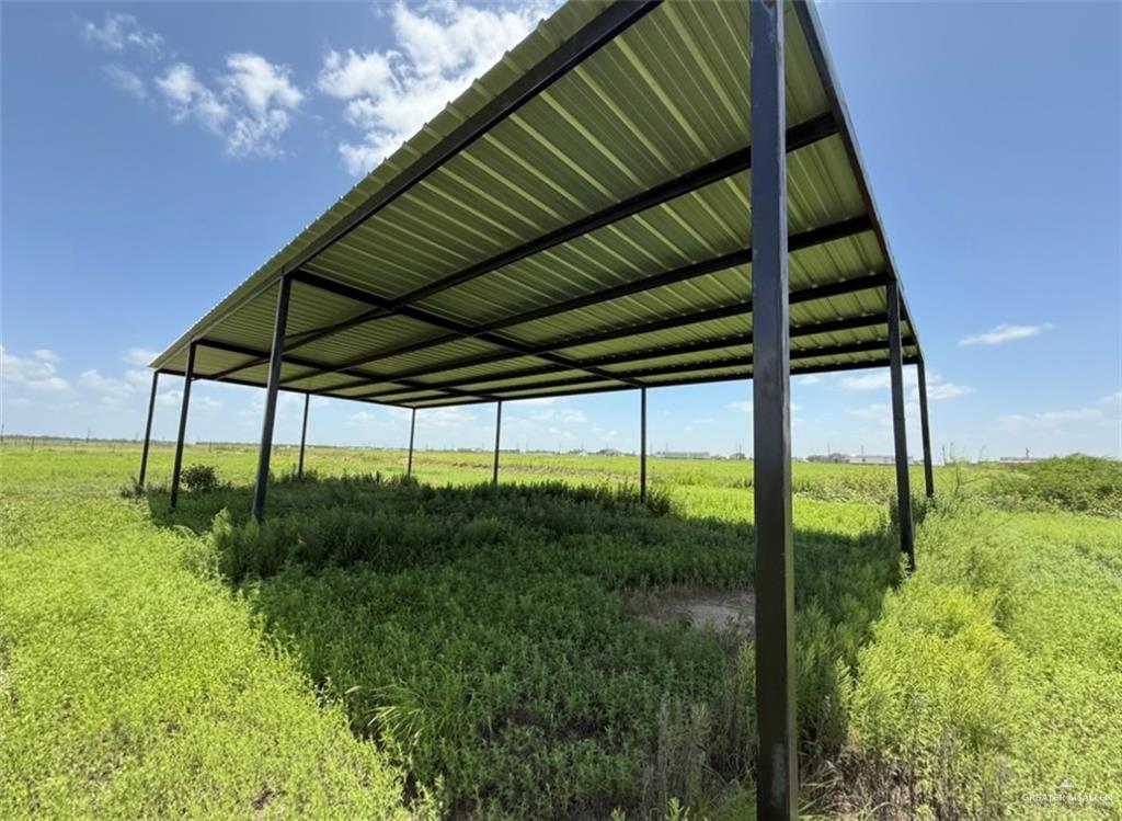 14865 Kyle Lane Edcouch, TX 78538 - Photo 9 of 12 View of vehicle parking featuring a view of countryside