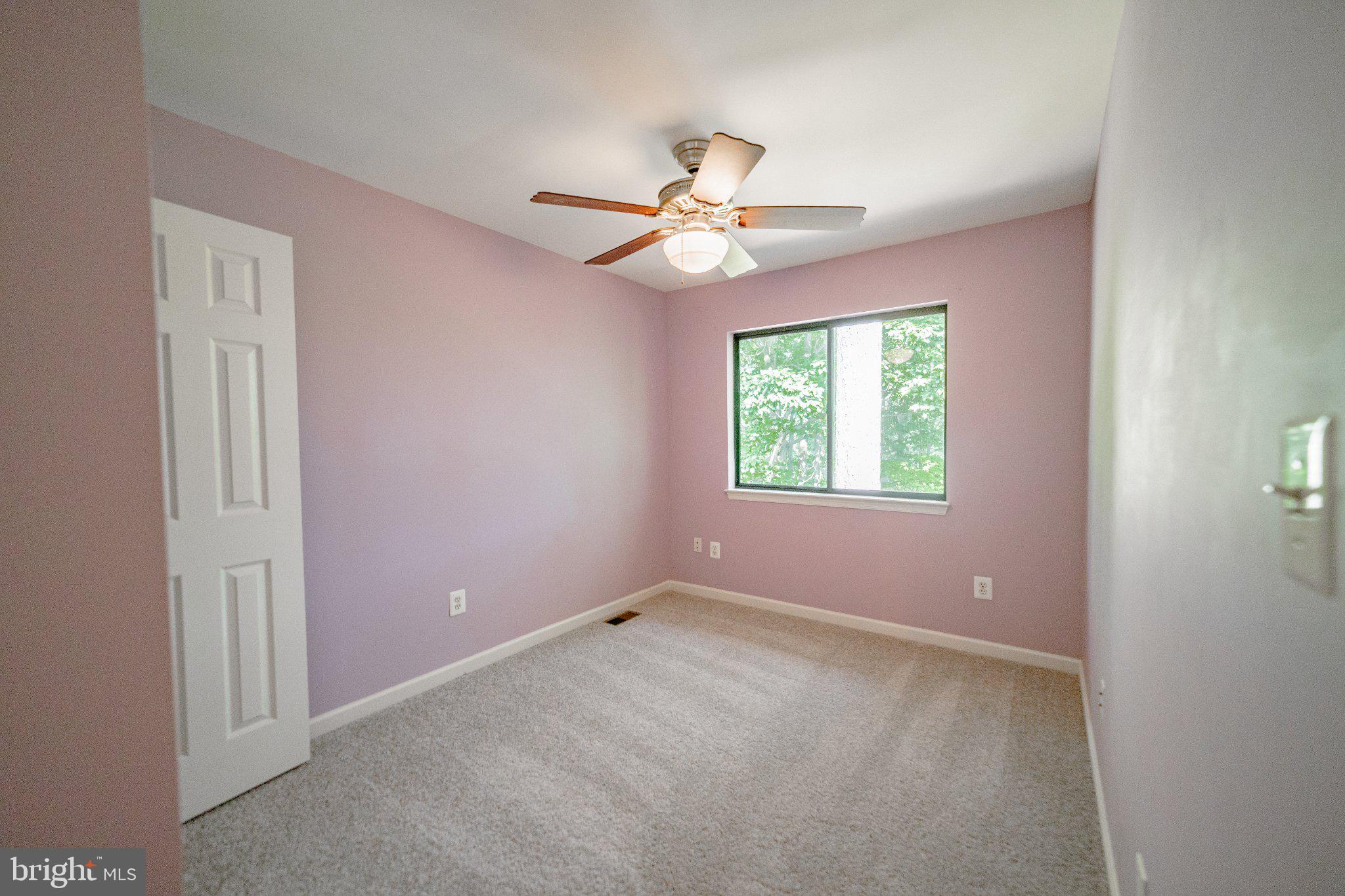 2205 Southgate Square, Unit 2205 Reston, VA 20191 - Photo 19 of 26 Serene pastel room with natural light.