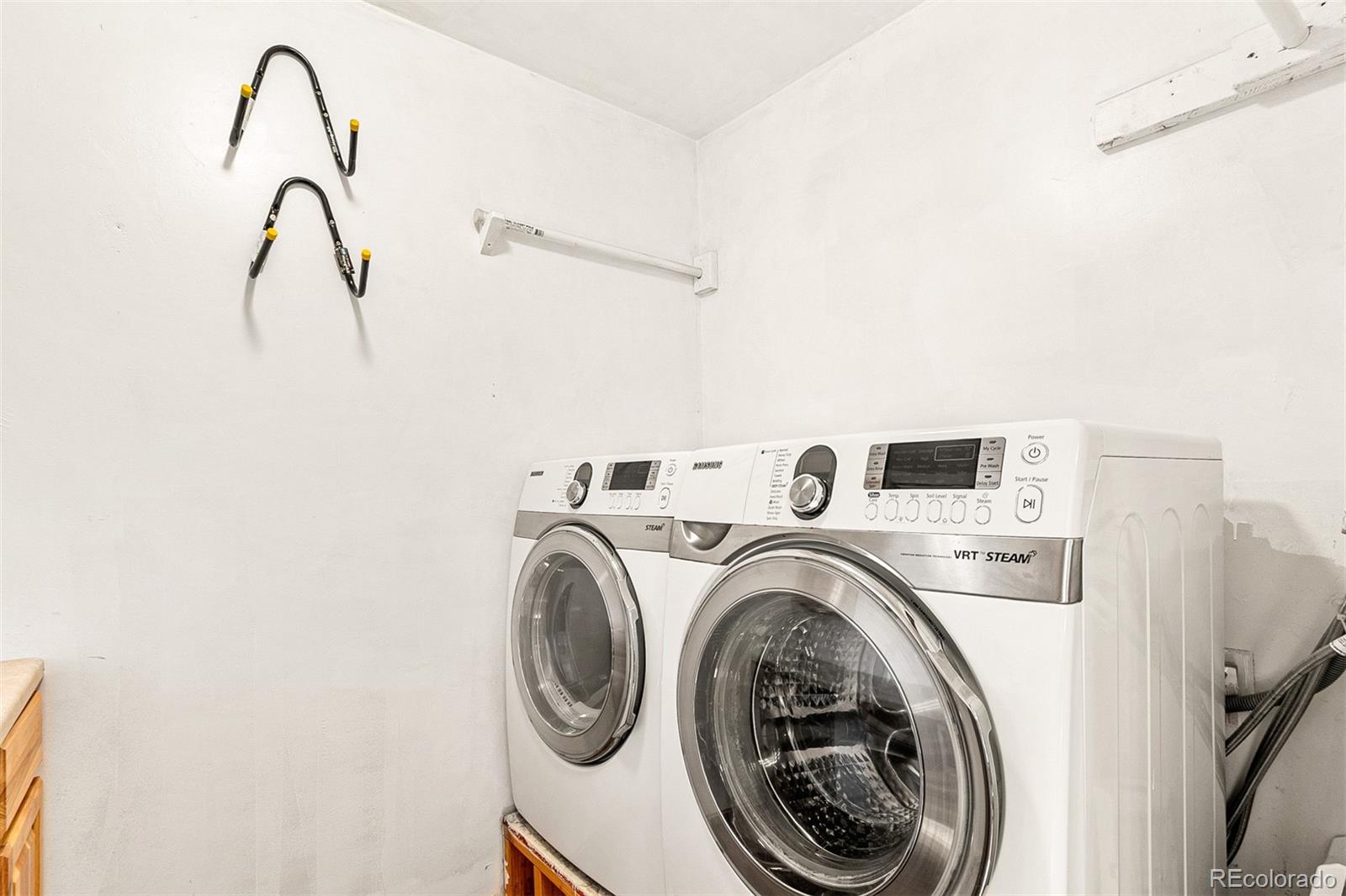 3252 Chase Street Wheat Ridge, CO 80212 - Photo 28 of 39 a utility room with dryer and washer