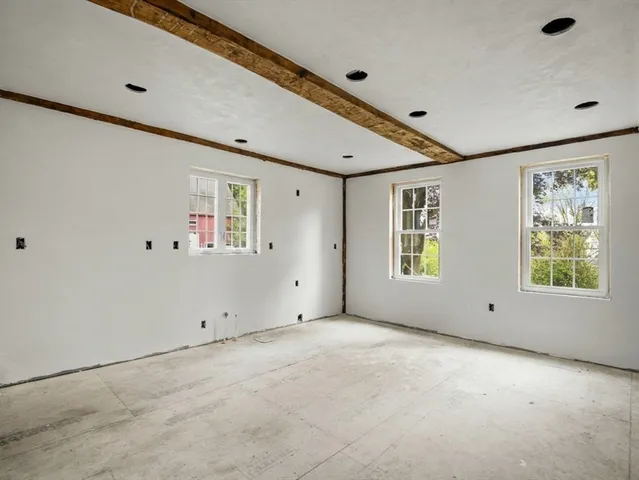 a view of an empty room with window