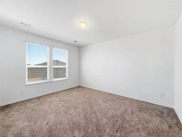 a bathroom with a sink a light fixture and a mirror
