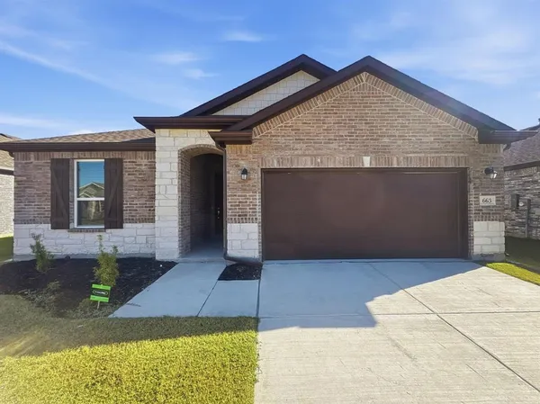 a view of a hallway with wooden floor and closet