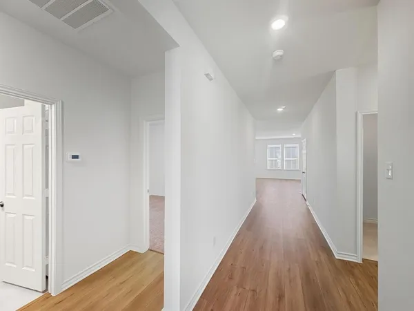 an empty room with windows