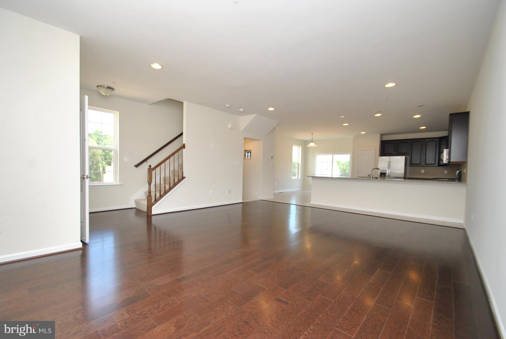 944 Winter Run Road Baltimore, MD 21220 - Photo 18 of 30 a view of an empty room with wooden floor