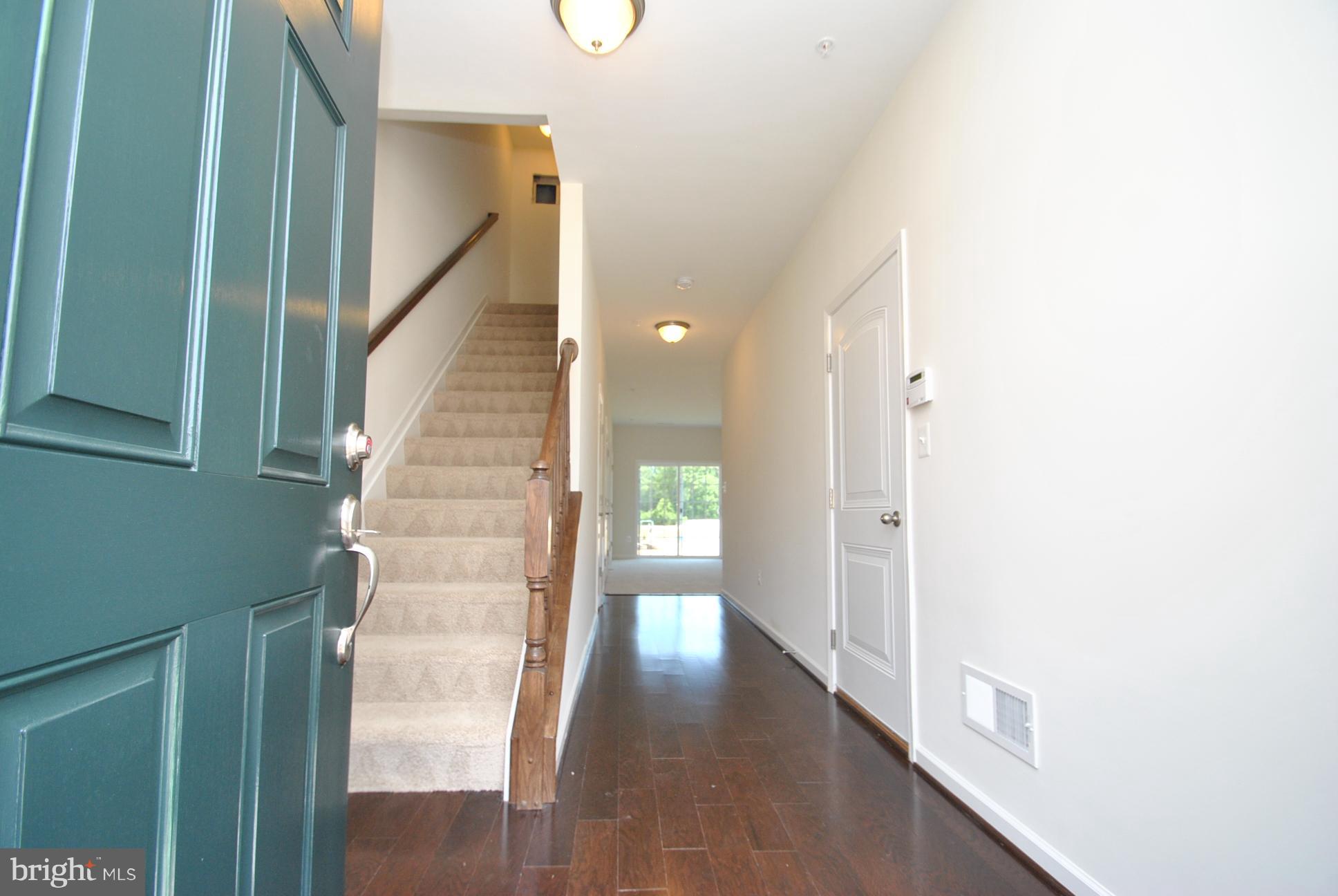 944 Winter Run Road Baltimore, MD 21220 - Photo 4 of 30 a view of an entryway with wooden floor