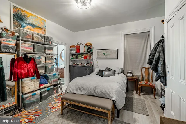 a bedroom with furniture and a bed