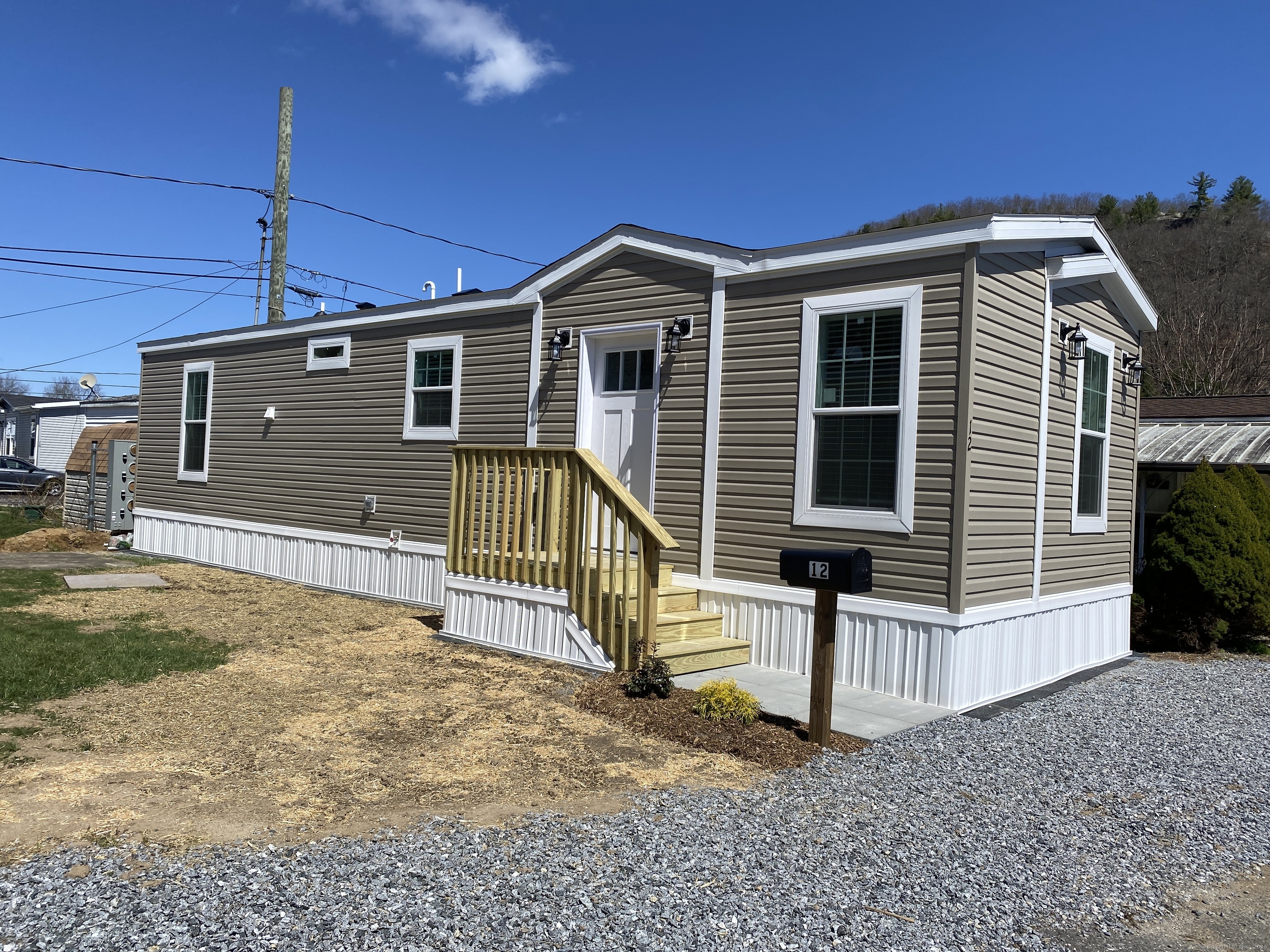 a front view of a house with a garage