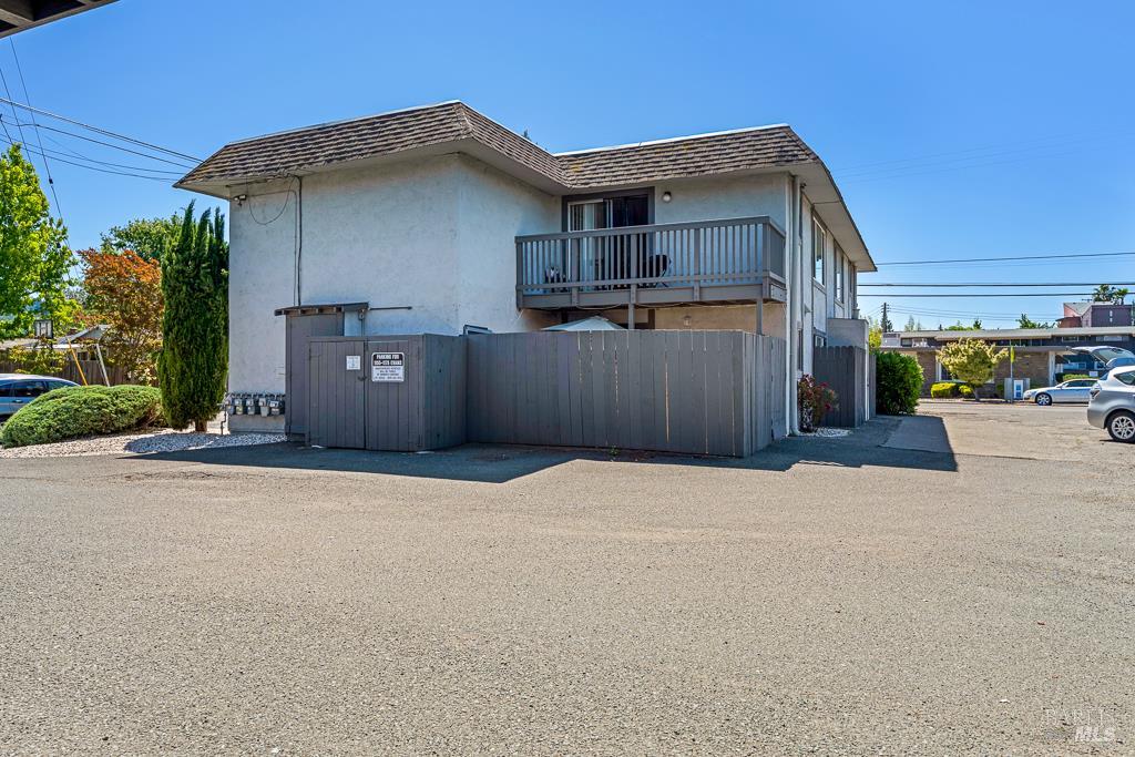 1155-1175 Evans Drive Santa Rosa, CA 95405 - Photo 5 of 31 a front view of a house with a yard and garage