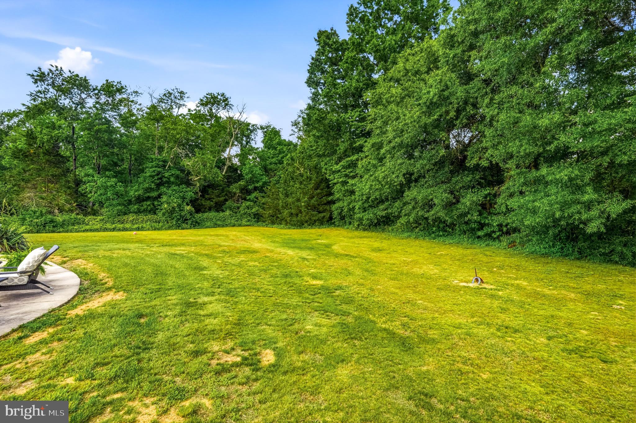 705 Garden Road Pittsgrove, NJ 08318 - Photo 65 of 72 a view of a swimming pool with an outdoor space and seating area