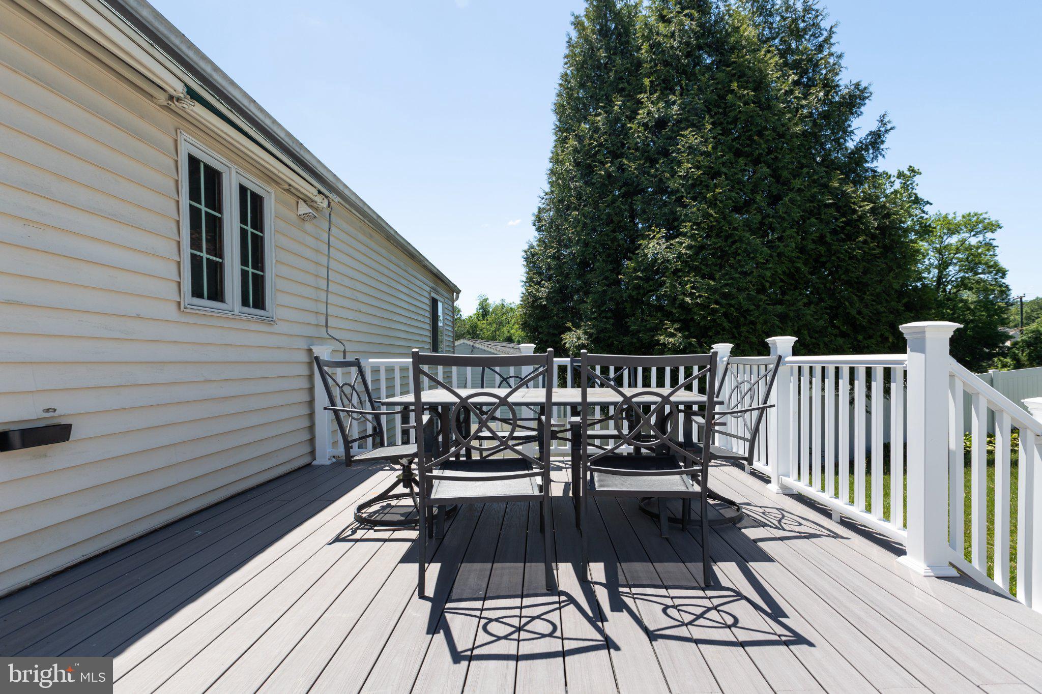 3613 Rusty Rim Ellicott City, MD 21043 - Photo 36 of 39 Sunny deck perfect for gatherings.