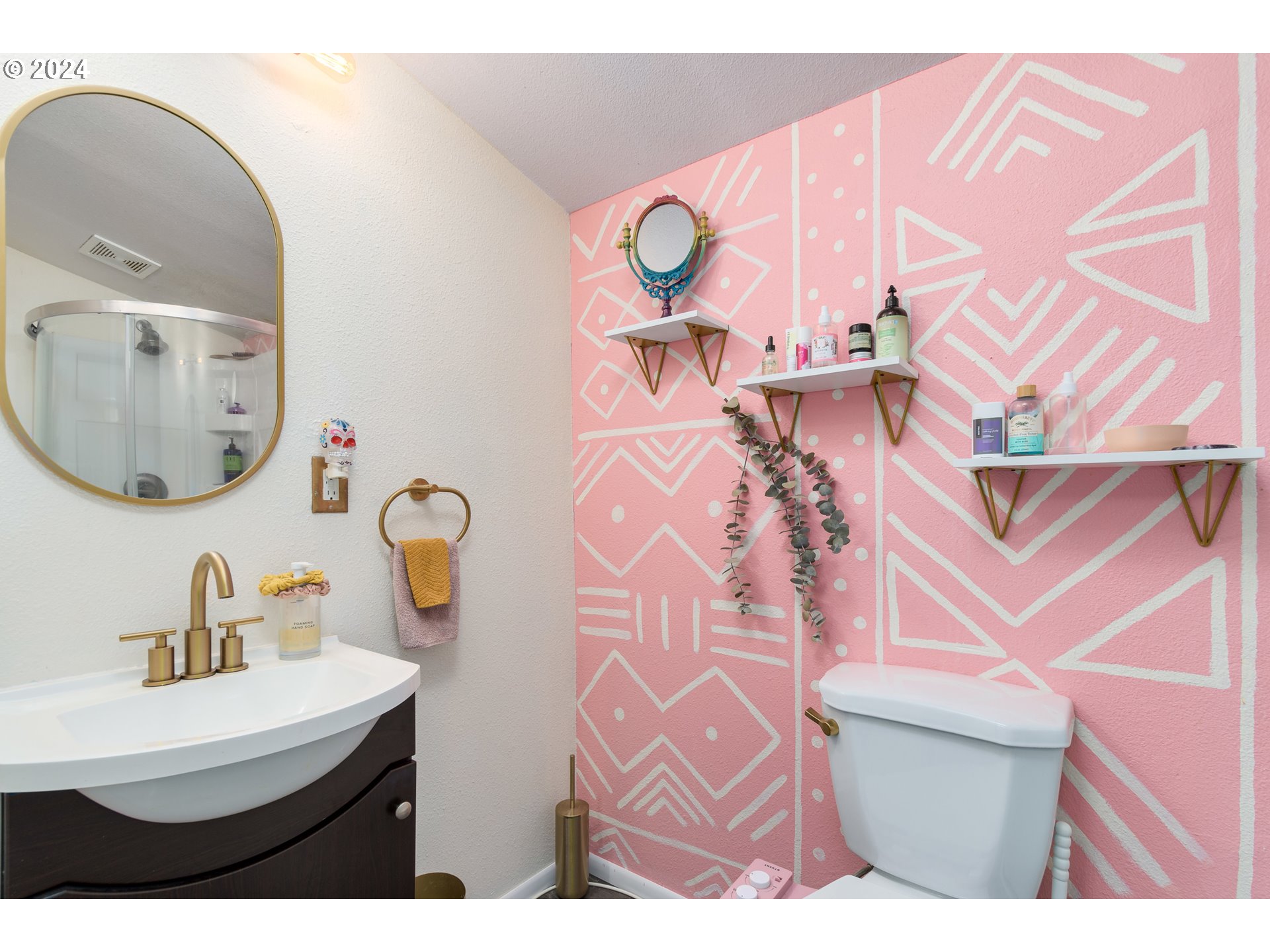 517 South 3rd Street Springfield, OR 97477 - Photo 16 of 27 a bathroom with a sink mirror and vanity