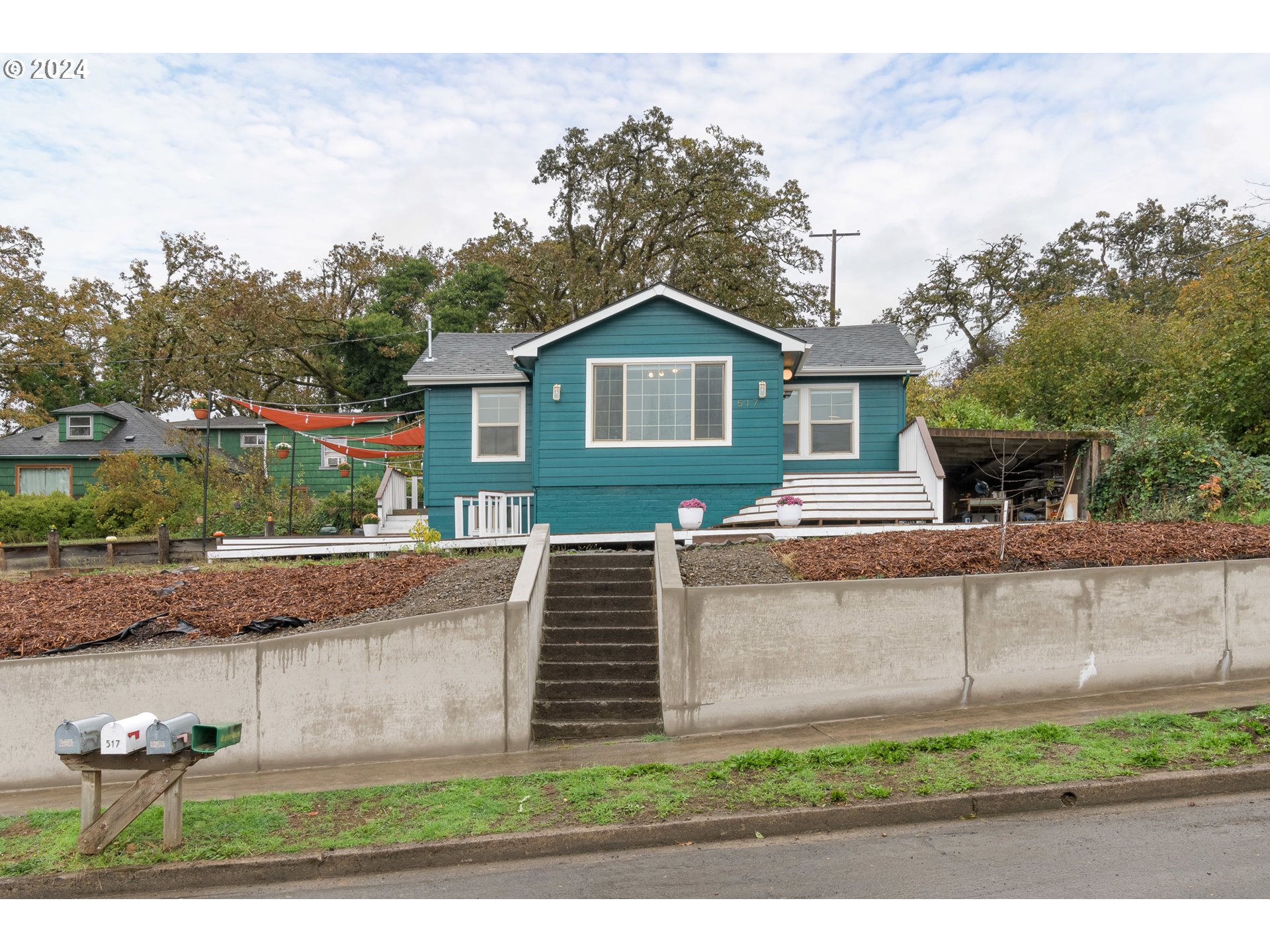 517 South 3rd Street Springfield, OR 97477 - Photo 24 of 27 a view of a house with a yard