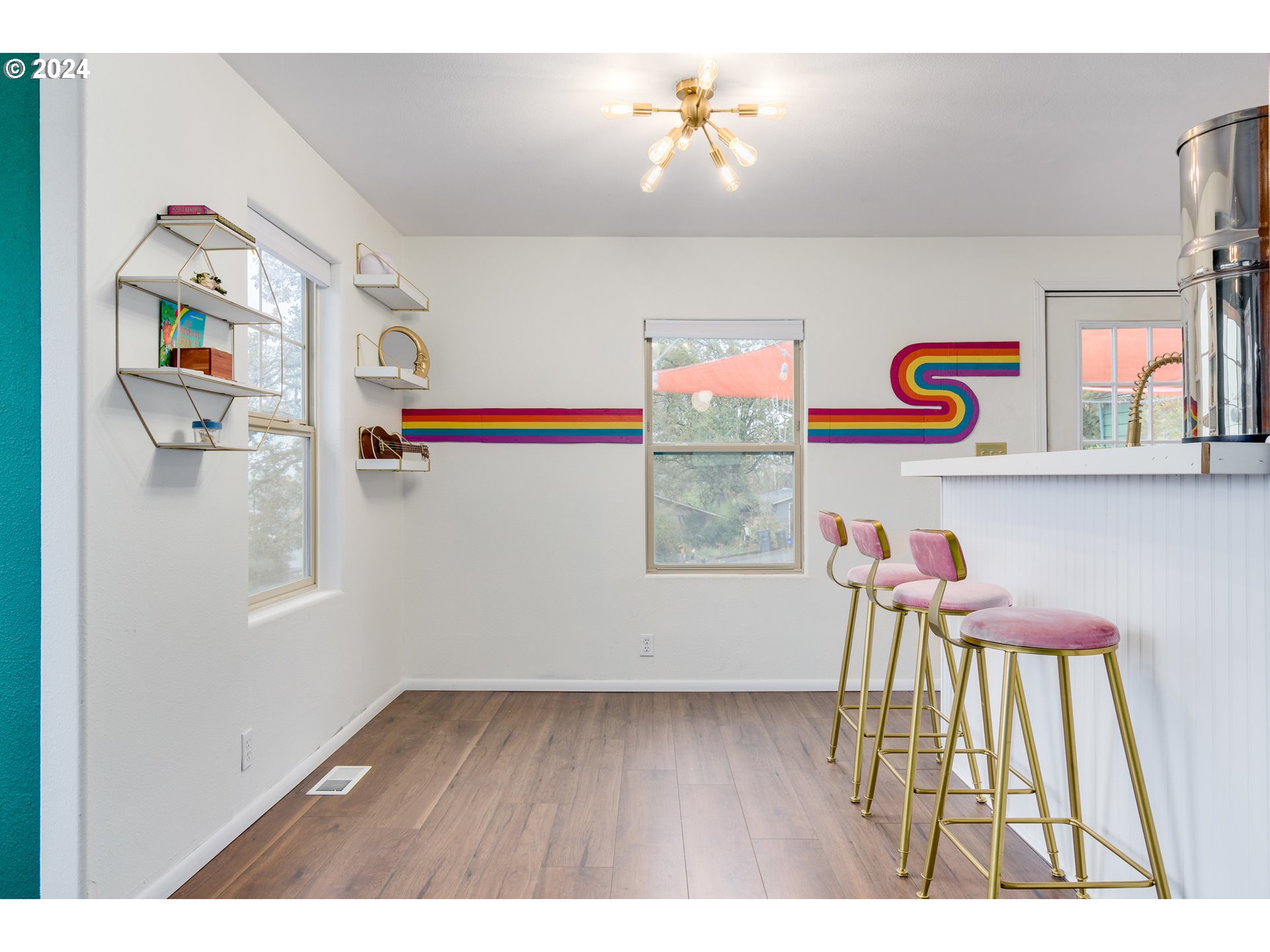 517 South 3rd Street Springfield, OR 97477 - Photo 7 of 27 a workspace with furniture and wooden floor