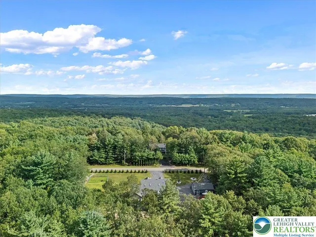 a view of lake with green space