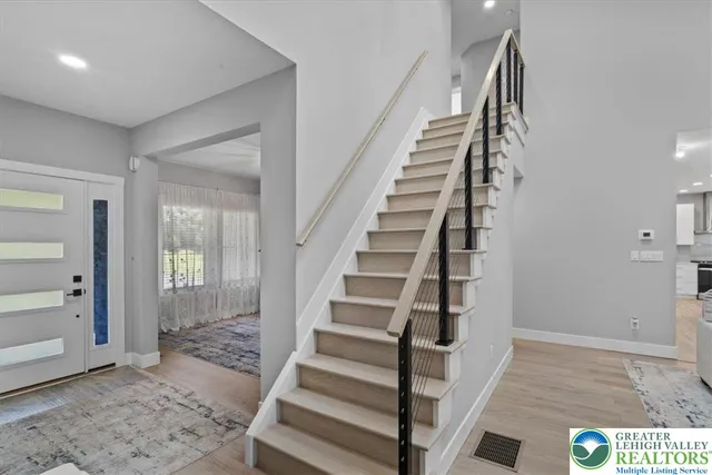 a bed room with a bed and a window