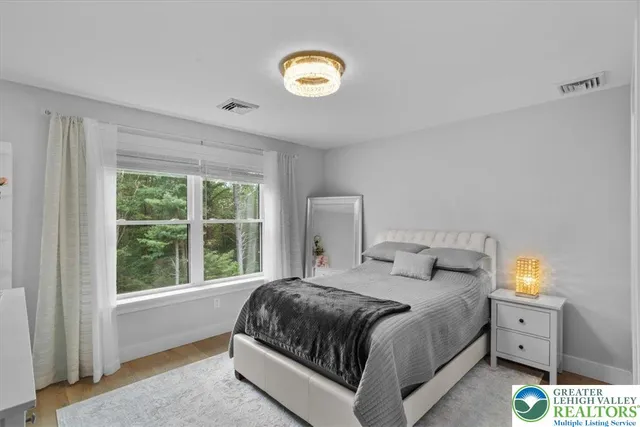 a view of a garage with rack and bicycle