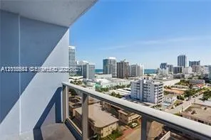a city view from a balcony with city view