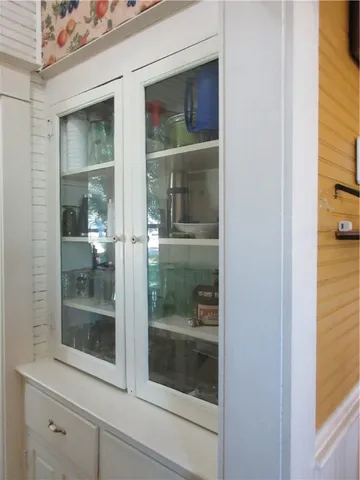 a view of a bathroom with a glass door and a glass door