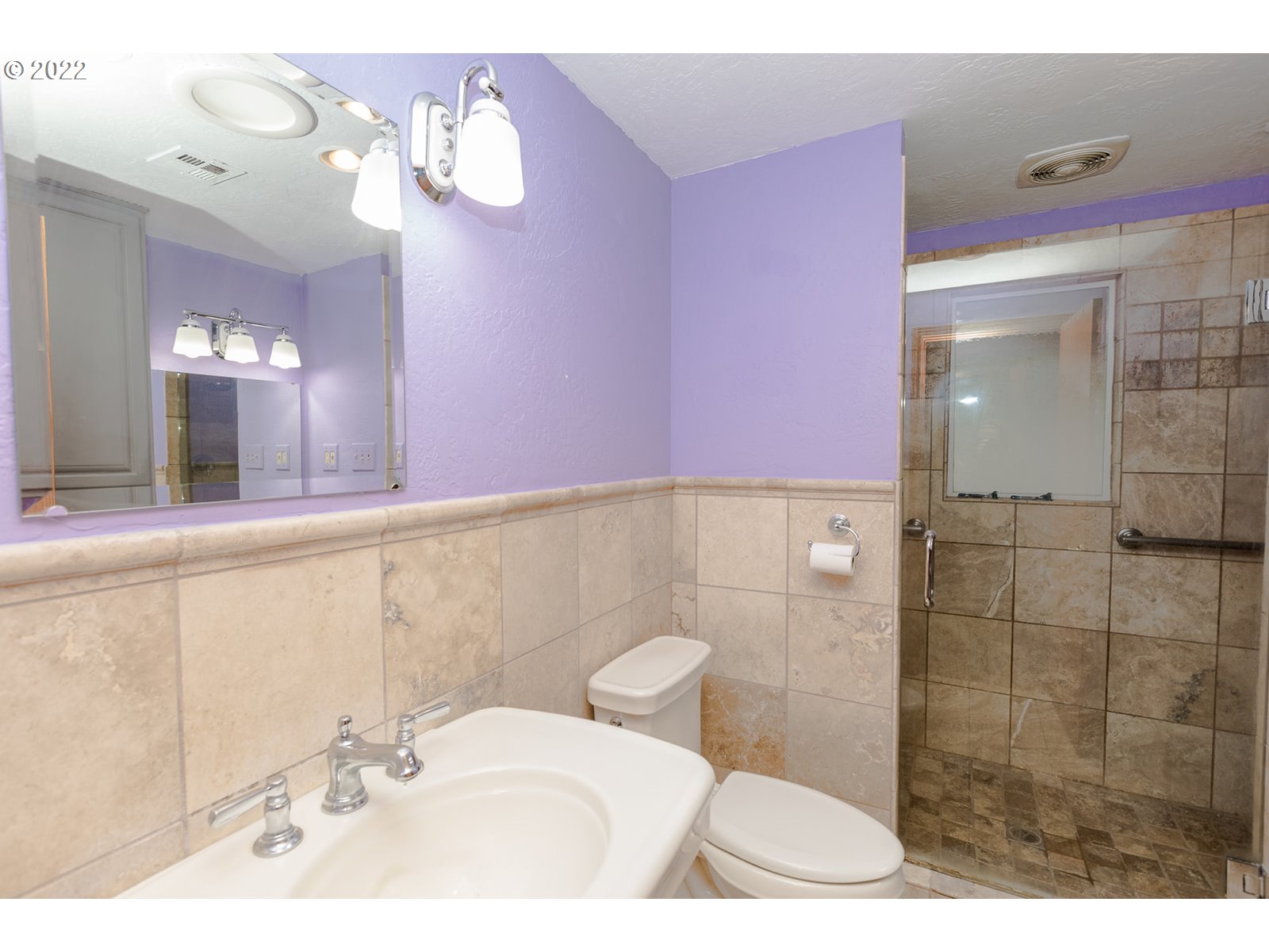 753 Rowan Avenue Springfield, OR 97477 - Photo 16 of 30 a bathroom with a sink a toilet and shower