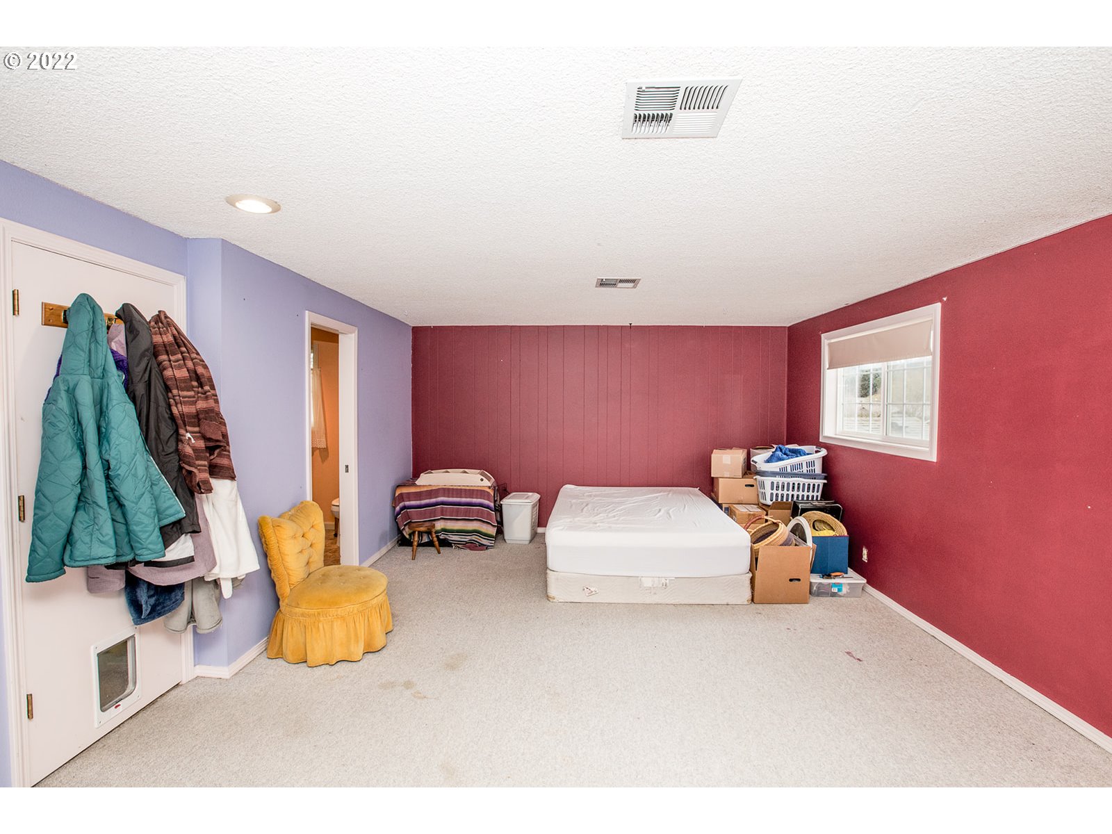 753 Rowan Avenue Springfield, OR 97477 - Photo 18 of 30 a bedroom with bed and a couch