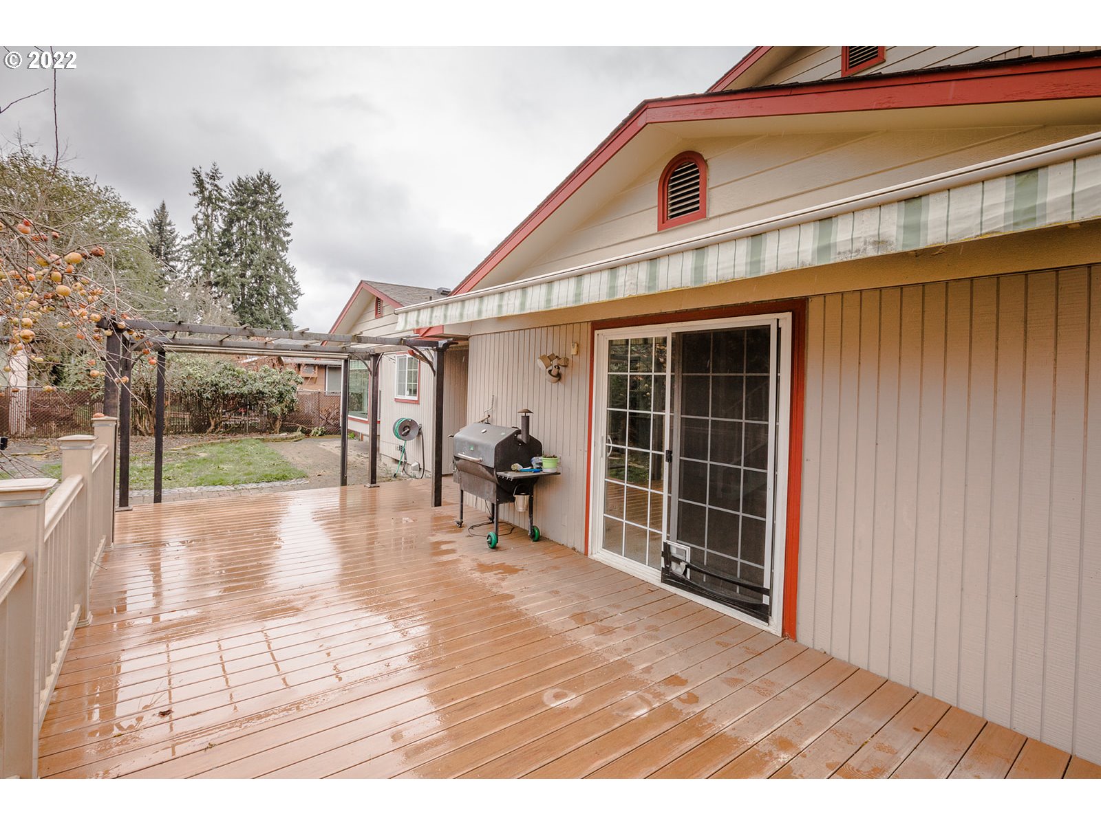 753 Rowan Avenue Springfield, OR 97477 - Photo 25 of 30 a view of a house with backyard porch and sitting area