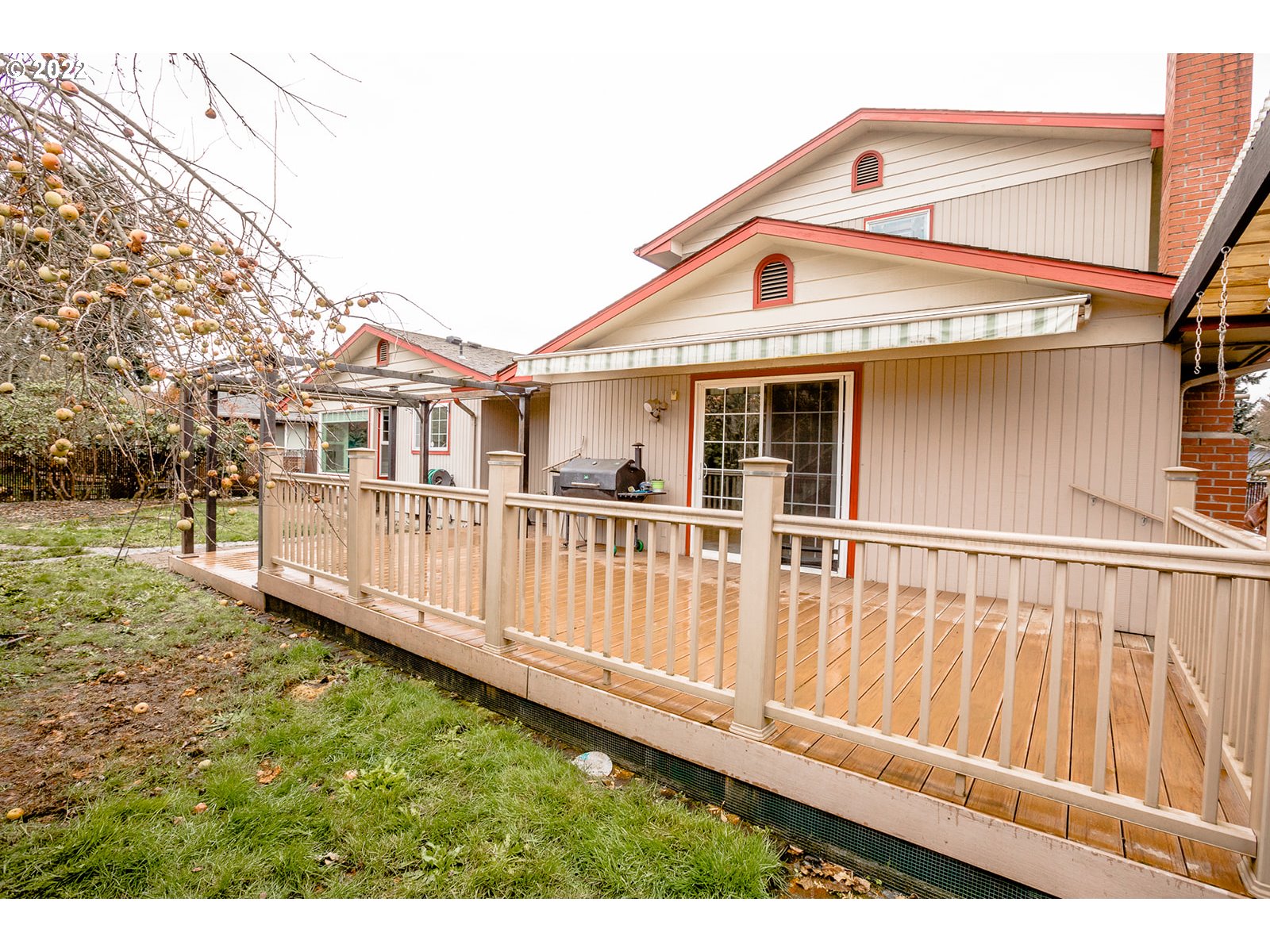 753 Rowan Avenue Springfield, OR 97477 - Photo 26 of 30 a view of a house with wooden deck
