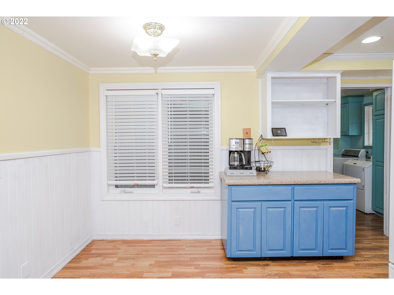 753 Rowan Avenue Springfield, OR 97477 - Photo 5 of 30 a kitchen with a window a sink and a window