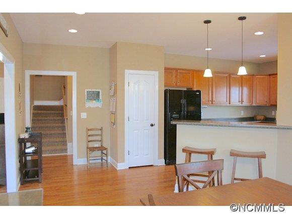 241 Hunters Trace Rutherfordton, NC 28139 - Photo 14 of 24 a kitchen with a table and chairs in it