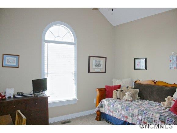 241 Hunters Trace Rutherfordton, NC 28139 - Photo 20 of 24 a bedroom with a bed and a window