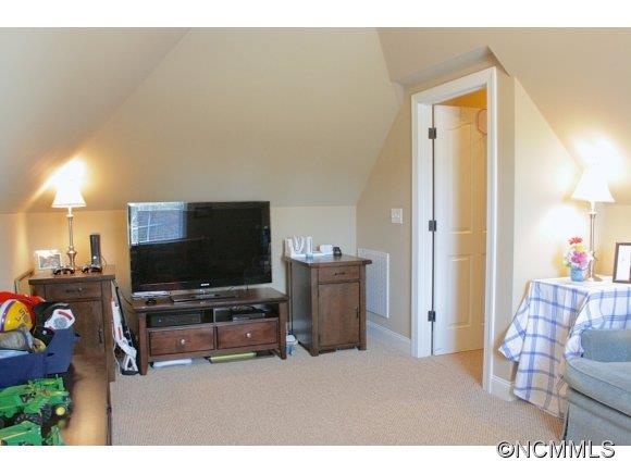 241 Hunters Trace Rutherfordton, NC 28139 - Photo 24 of 24 a living room with furniture and a flat screen tv
