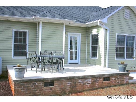 241 Hunters Trace Rutherfordton, NC 28139 - Photo 4 of 24 a view of house and outdoor space with seating area