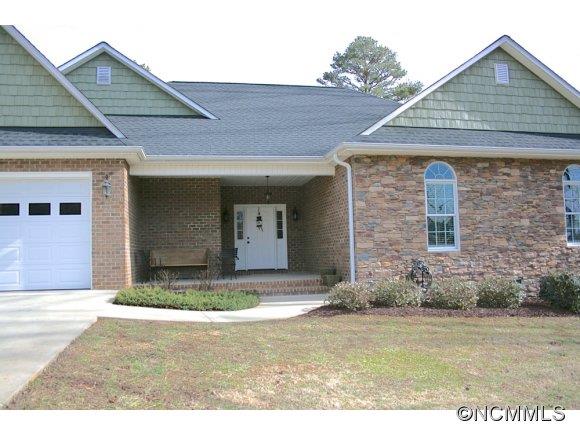 241 Hunters Trace Rutherfordton, NC 28139 - Photo 6 of 24 a front view of a house with a yard