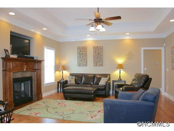 241 Hunters Trace Rutherfordton, NC 28139 - Photo 9 of 24 a living room with furniture and a flat screen tv