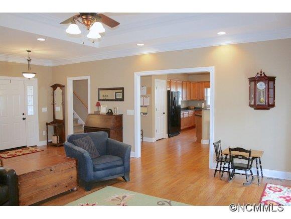 241 Hunters Trace Rutherfordton, NC 28139 - Photo 10 of 24 a living room with furniture and a dining table