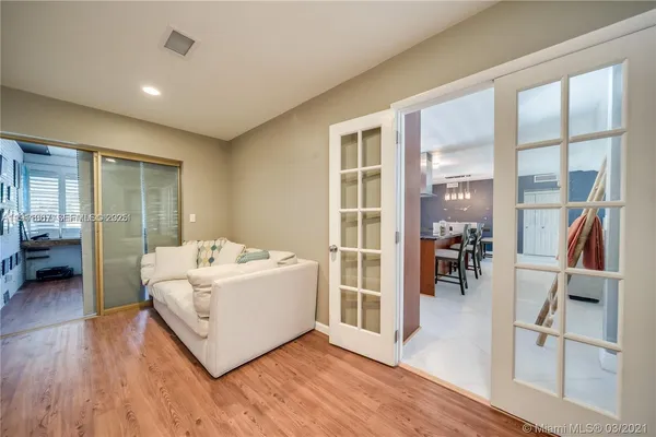 a spacious bedroom with a bed and a table