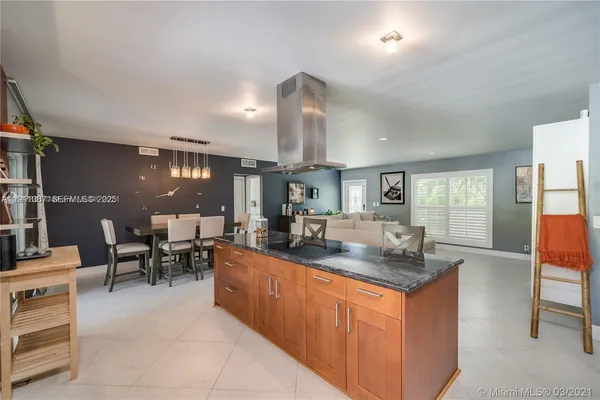 a kitchen with granite countertop lots of counter top space
