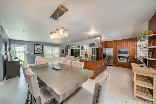 a view of a dining room with furniture
