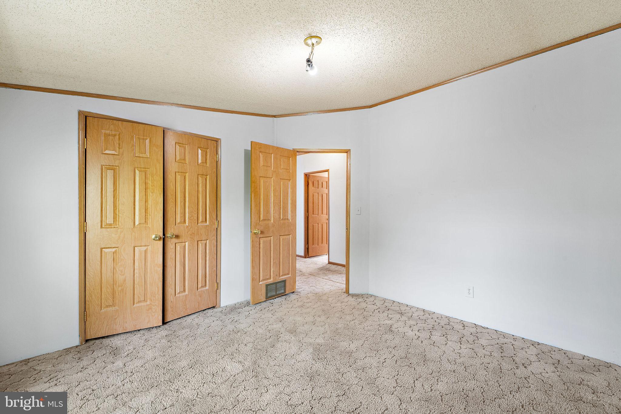 402 Ford Hook Road Doylestown, PA 18901 - Photo 11 of 26 an empty room with windows