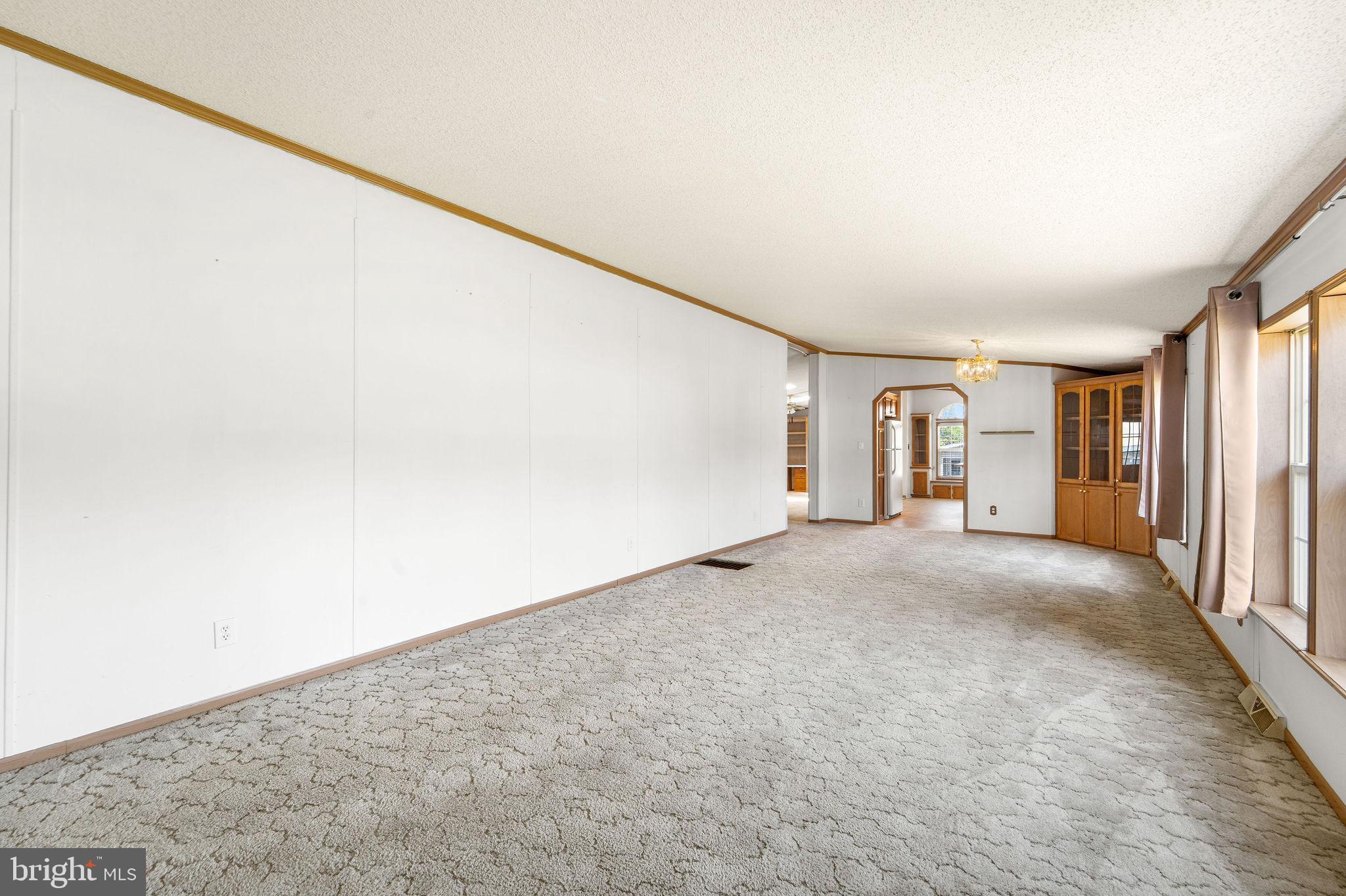 402 Ford Hook Road Doylestown, PA 18901 - Photo 15 of 26 a view of a big room with closet and windows