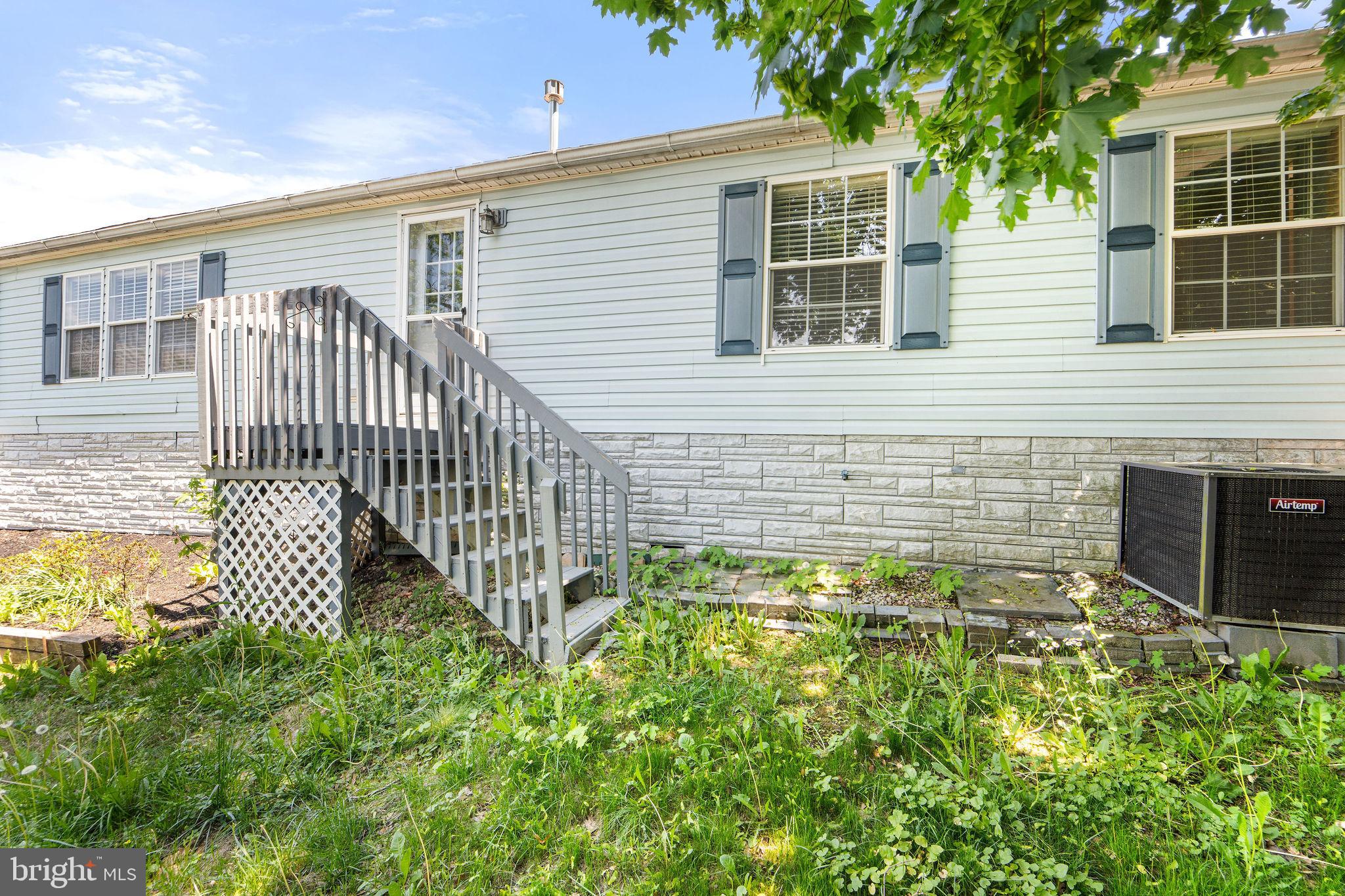 402 Ford Hook Road Doylestown, PA 18901 - Photo 5 of 26 a view of a house with a yard and pathway