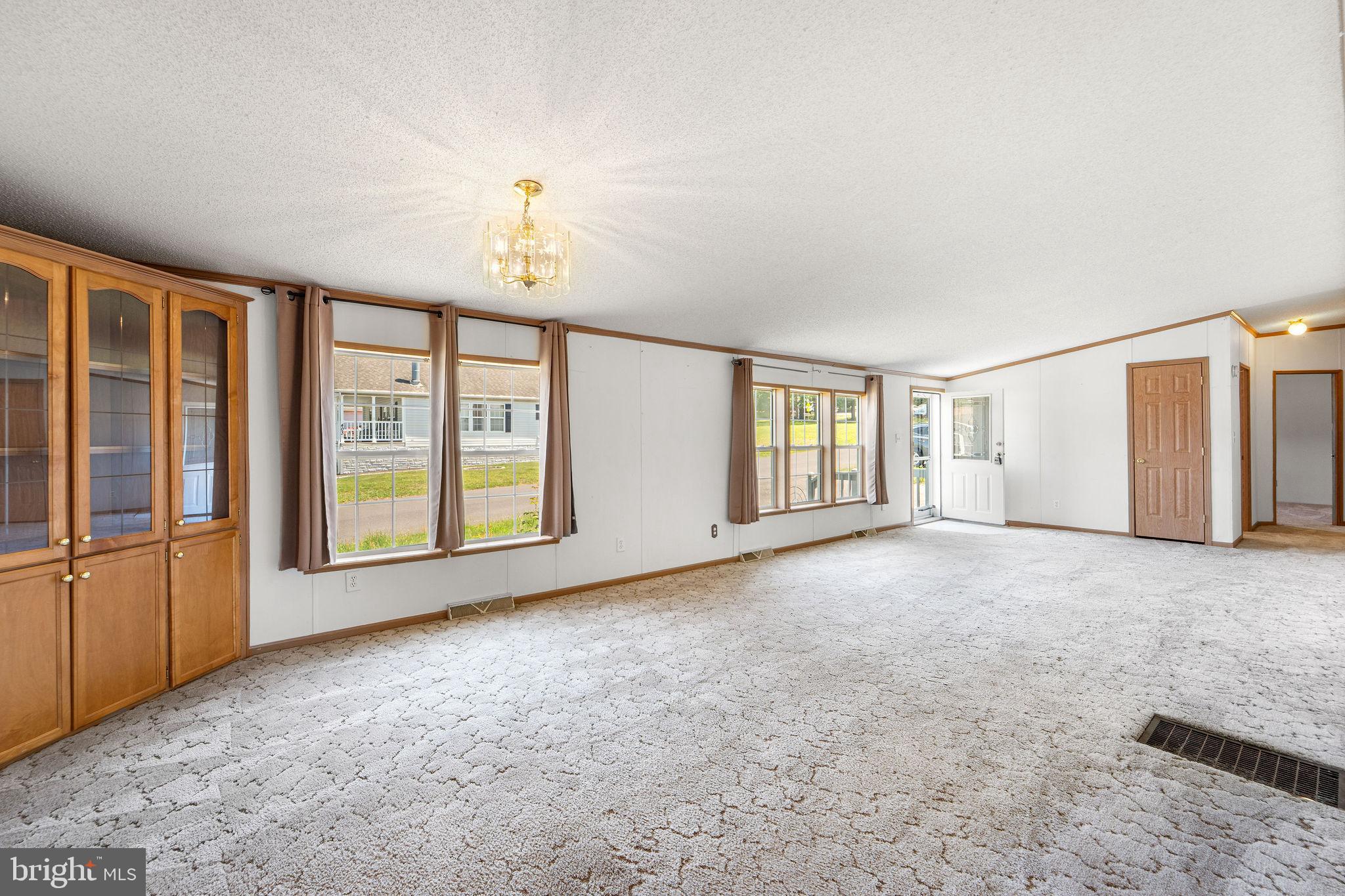 402 Ford Hook Road Doylestown, PA 18901 - Photo 7 of 26 a view of an empty room with a window