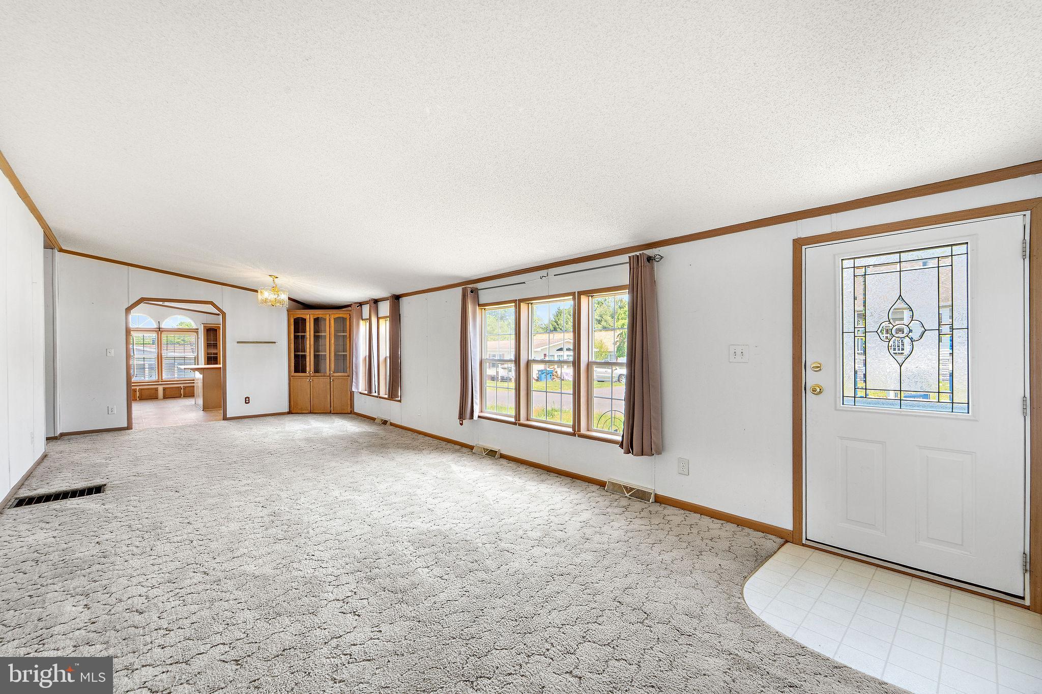 402 Ford Hook Road Doylestown, PA 18901 - Photo 8 of 26 a view of an empty room with a window