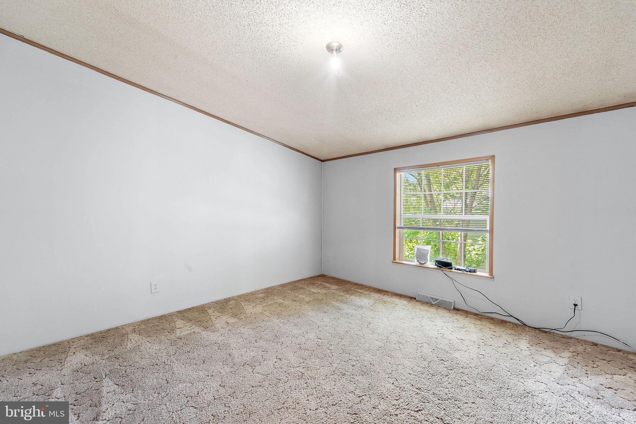 402 Ford Hook Road Doylestown, PA 18901 - Photo 10 of 26 an empty room with a window