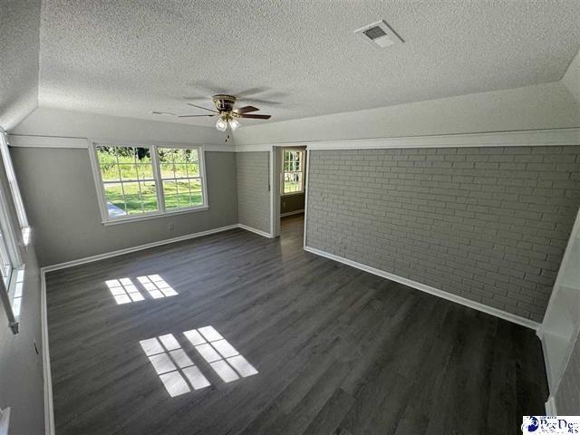 1057 Sam Lee Road Scranton, SC 29591 - Photo 14 of 23 Bonus room with dark hardwood / wood-style floors,