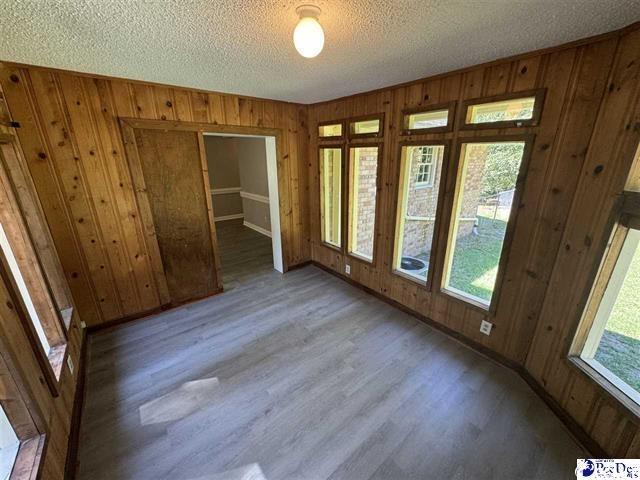 1057 Sam Lee Road Scranton, SC 29591 - Photo 20 of 23 Unfurnished room with plenty of natural light, woo