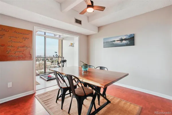 a view of a dining room with furniture