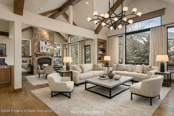 a bedroom with a bed and a fireplace